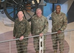 Senior Enlisted Advisor to the Chairman of the Joint Chiefs of Staff Marine Corps Sgt. Maj. Troy E. Black, DLA Director Army Lt. Gen. Mark Simerly, and DLA Senior Enlisted Advisor Air Force Chief Master Sgt. Alvin Dyer, pose for a photo