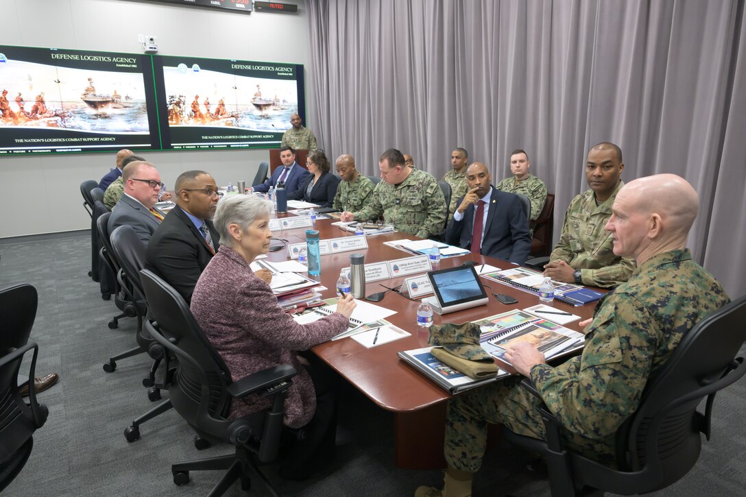 Senior Enlisted Advisor to the Chairman of the Joint Chiefs of Staff Marine Corps Sgt. Maj. Troy E. Black, receives an agency overview brief from senior leaders