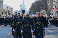 Marines march in a small formation