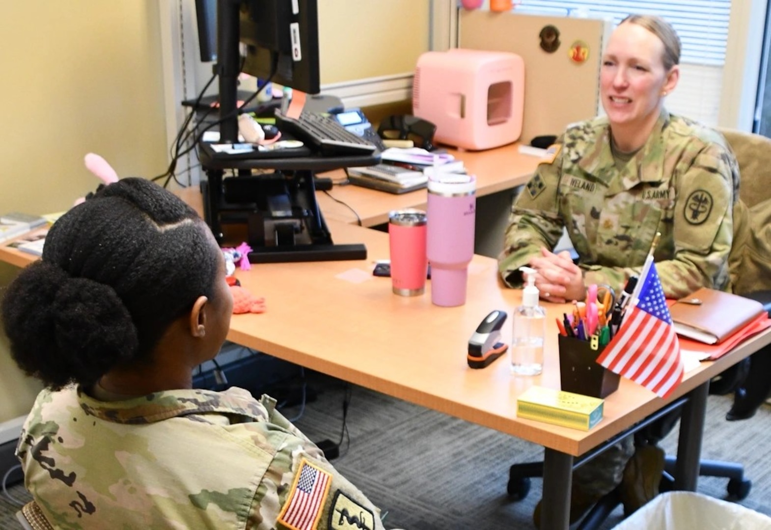 Maj. Jennifer Iveland, Clinical Psychologist at Womack Army Medical Center, counsels a patient regarding behavioral health.