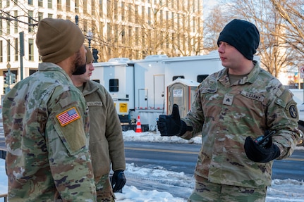 Service members have a discussion