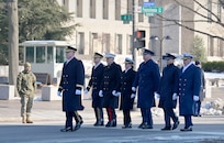 Small group of service members lead the parade
