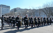 Marine Band members march in a parade