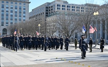 Airmen march in a parade