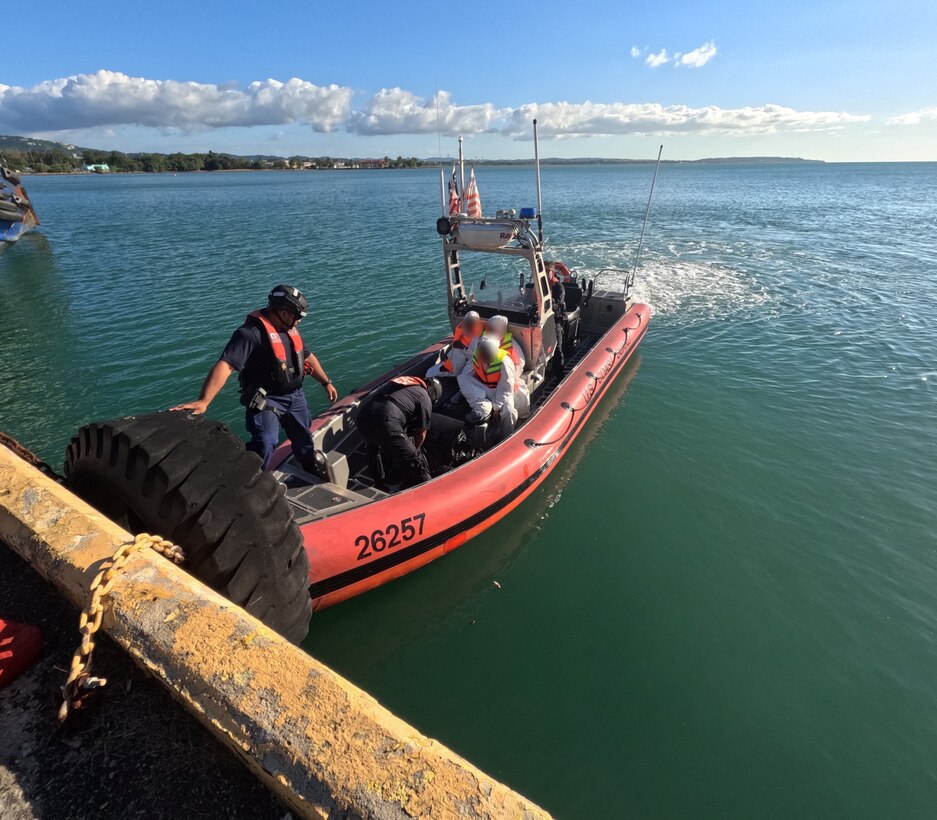 U.S. Border Patrol and Homeland Security Investigations agents in Mayaguez, Puerto Rico, receive custody of four migrants from a Coast Guad boat crew, following the interdiction of an unlawful irregular migration voyage off, Puerto Rico, Jan. 13, 2025. The migrants face possible federal prosecution by the U.S. Attorney’s Office for the District of Puerto Rico on charges of attempt to illegally reenter the United States in violation of Title 8 U.S.C. Section 1326, and failure to heave in violation of Title 18 U.S.C. Section 2237. (U.S. Coast Guard photo)