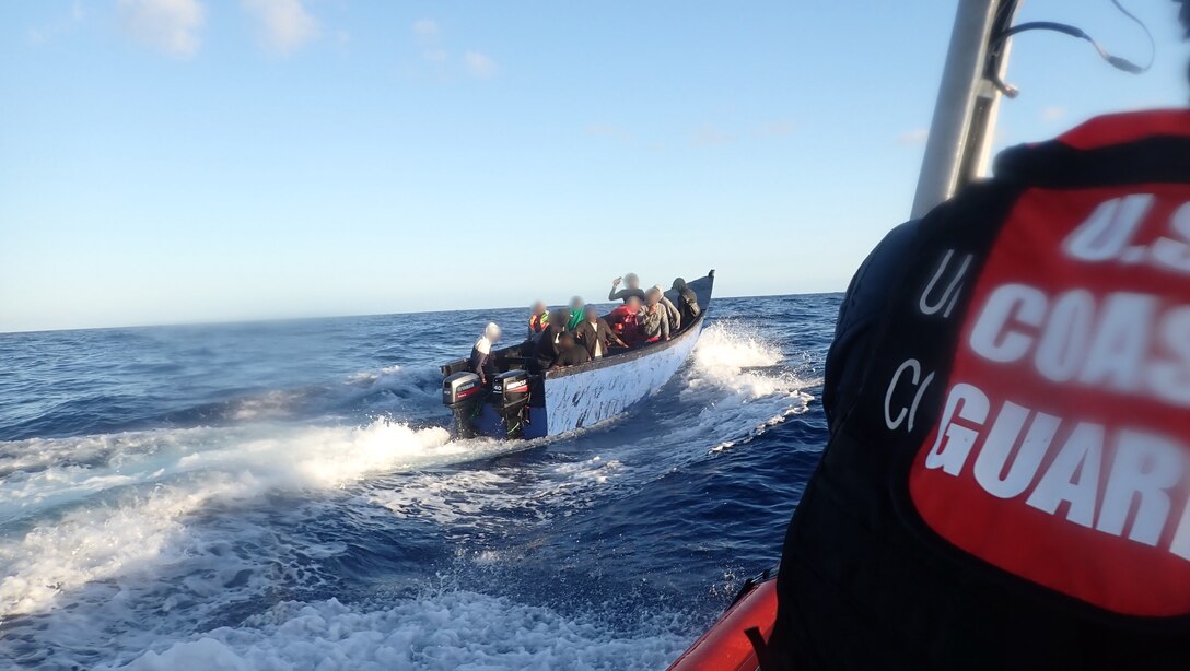 Coast Guard Cutter Joseph Tezanos small boat crew pursues a makeshift vessel with migrants during an interdiction off Puerto Rico, Jan. 13, 2024.  The Coast Guard Cutter Joseph Doyle returned 37 migrants interdicted in this voyage along with 21 migrants from a separate interdiction to San Pedro de Macoris, Dominican Republic, Jan. 15, 2025. (U.S. Coast Guard photo)