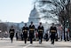 Soldiers march with U.S. Capitol in the background