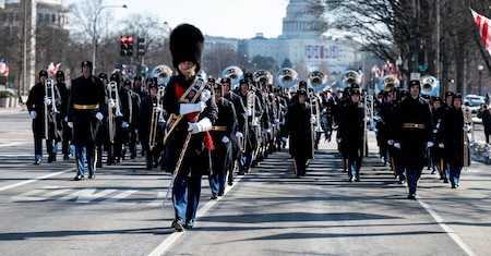 Army Band marches during a parade rehearsal