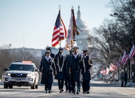 Coast Guard Color Guard team marches away from the U.S. Capitol