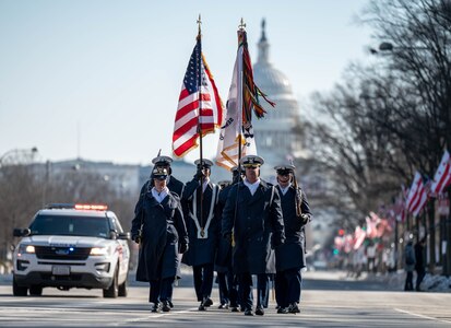 Coast Guard Color Guard team marches away from the U.S. Capitol