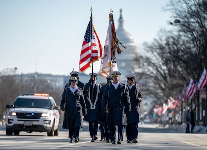 Coast Guard Color Guard team marches away from the U.S. Capitol