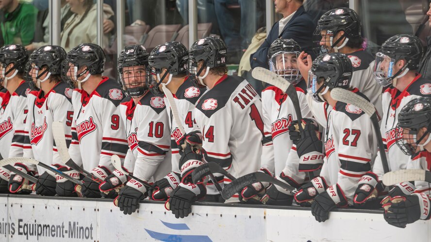 Minot State University Beavers players cheer on their teammates during the MSU military appreciation hockey game at Maysa Arena, Minot, North Dakota, Jan. 11, 2025. The Beavers led throughout the game and scored a total of 12 goals. (U.S. Air Force photo by Senior Airman Kyle Wilson)