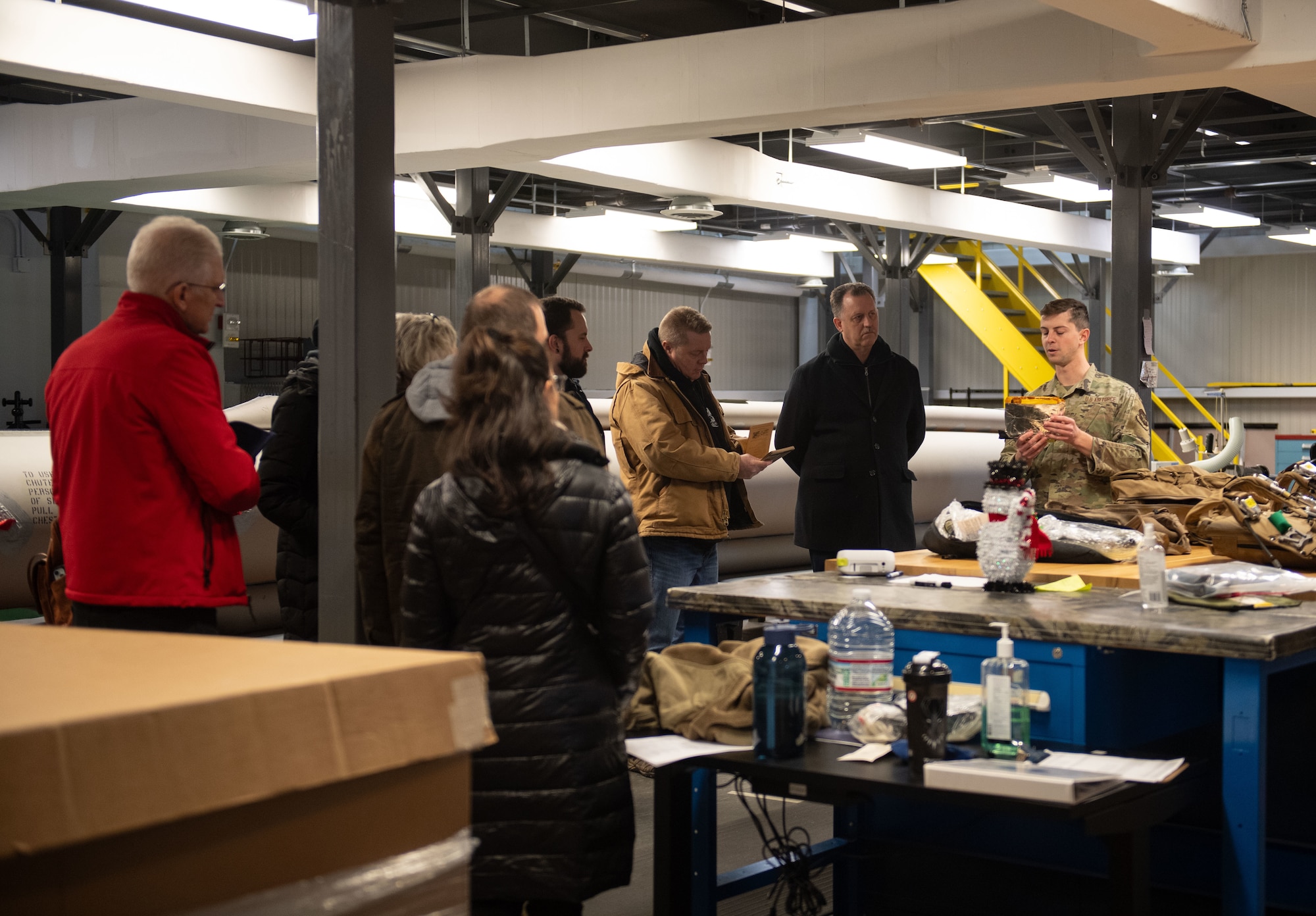 Airman demonstrates flight equipment