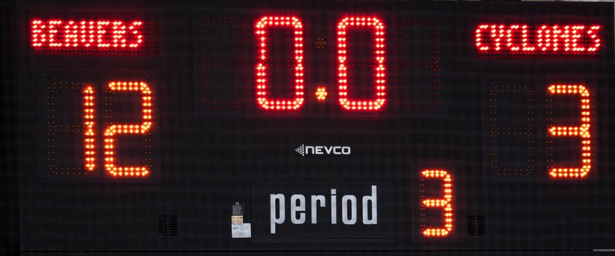 The scoreboard displays a score of 12-3 during the Minot State University military appreciation hockey game at Maysa Arena, Minot, North Dakota, Jan. 11, 2025. The MSU Beavers defeated the Iowa State University Cyclones by a score of 12-3. (U.S. Air Force photo by Senior Airman Kyle Wilson)