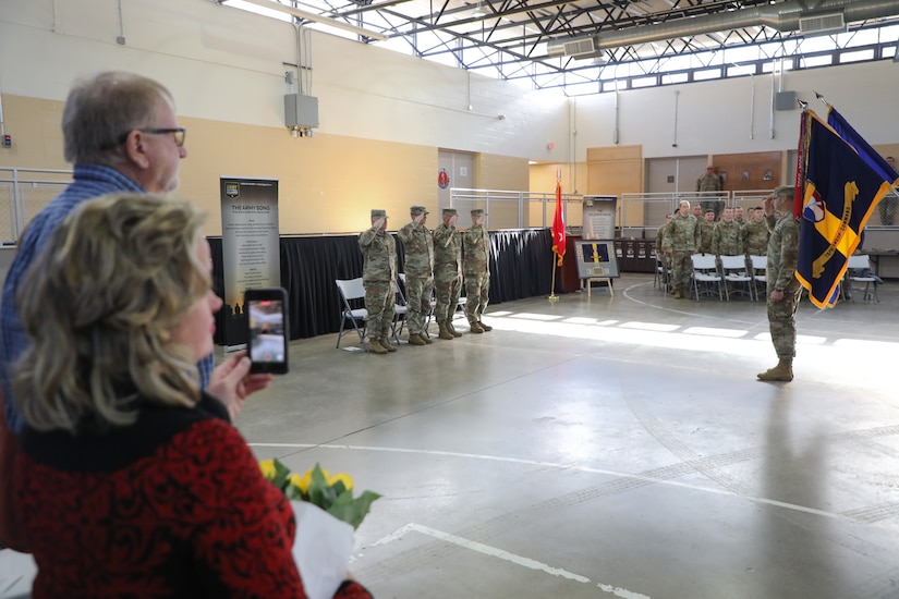 Jessica Engels, wife of Col. Steven Engels, takes video of the Change of Command ceremony held at the Wellman Armory on Boone National Guard Center in Frankfort, Ky. Jan 12, 2025.