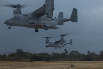 U.S. Marines with 31st Marine Expeditionary Unit, conduct fast rope training from MV-22 Ospreys assigned to Marine Medium Tiltrotor 262 (Rein.) at Camp Hansen, Okinawa, Japan, Jan. 15, 2025.