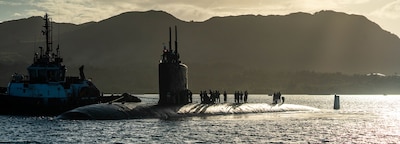 NAVAL BASE GUAM (Jan. 12, 2025) — The Los Angeles-class fast-attack submarine USS Columbia (SSN 771) transits Apra Harbor, Naval Base Guam, Jan. 12, 2025. Columbia is on deployment supporting the U.S. 7th Fleet, the U.S. Navy’s largest forward-deployed numbered fleet, operating with allies and partners in preserving a free and open Indo-Pacific region. (U.S. Navy photo by Lt. James Caliva)