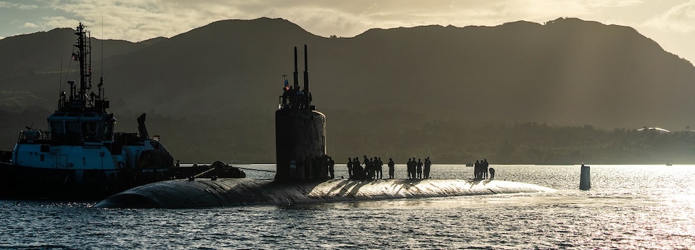 The Los Angeles-class fast-attack submarine USS Columbia (SSN 771) transits Apra Harbor, Naval Base Guam, Jan. 12, 2025.