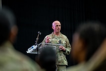 Chief Master Sgt. of the Air Force David Flosi speaks to members of the 482d Fighter Wing at Homestead Air Reserve Base.