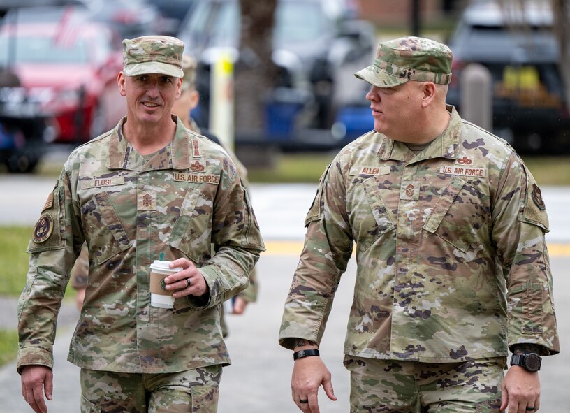Chief Master Sgt. of the Air Force David Flosi walks with Chief Master Sgt. Jeremy Allen