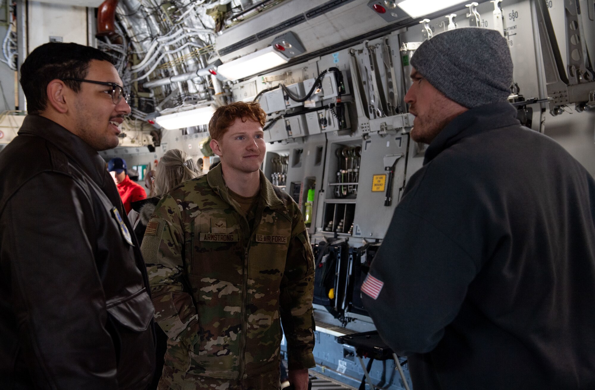 Airmen talk with honorary commander