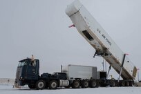Airmen assigned to the 91st Missile Maintenance Squadron use a transporter erector to accomplish Minuteman III missile maintenance at Minot Air Force Base, North Dakota, Jan. 14, 2025. The transporter erector has been a piece of equipment used since its creation in the late 1980s and has served as a reliable and efficient way of performing missile maintenance and transport. (U.S. Air Force photo by Airman 1st Class Wesley Davies)