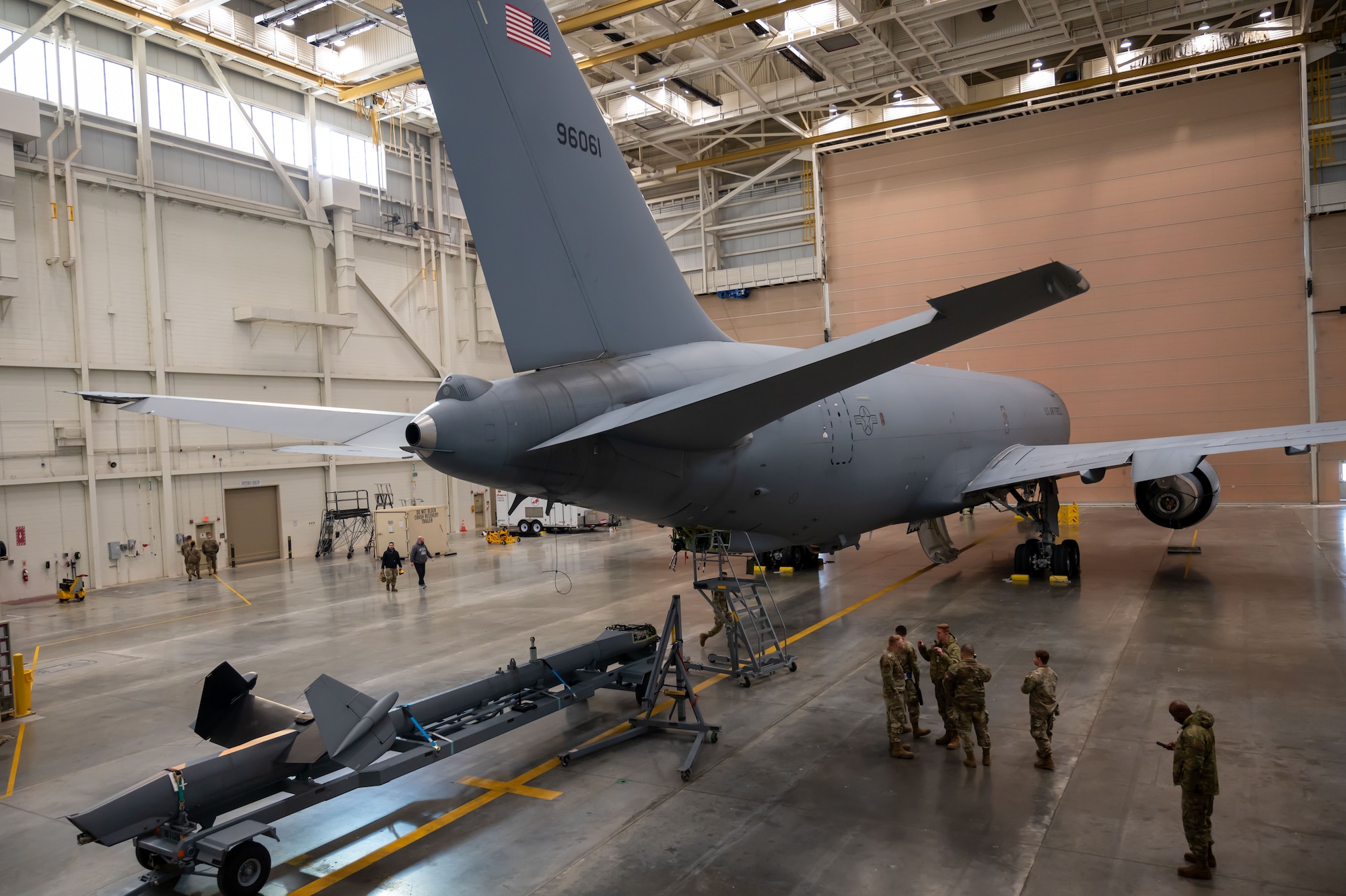 A KC-46A Pegasus aircraft sits in a hangar awaiting repair to its boom gimbal by members of the 605th Aircraft Maintenance Squadron at Joint Base McGuire-Dix-Lakehurst, N.J., Jan. 14, 2025. The 605th AMXS is responsible for flight line maintenance, inspection and repair efforts that keep the KC-46A flying and ready to perform its mission. (U.S. Air Force photo by Susan Moriarty)