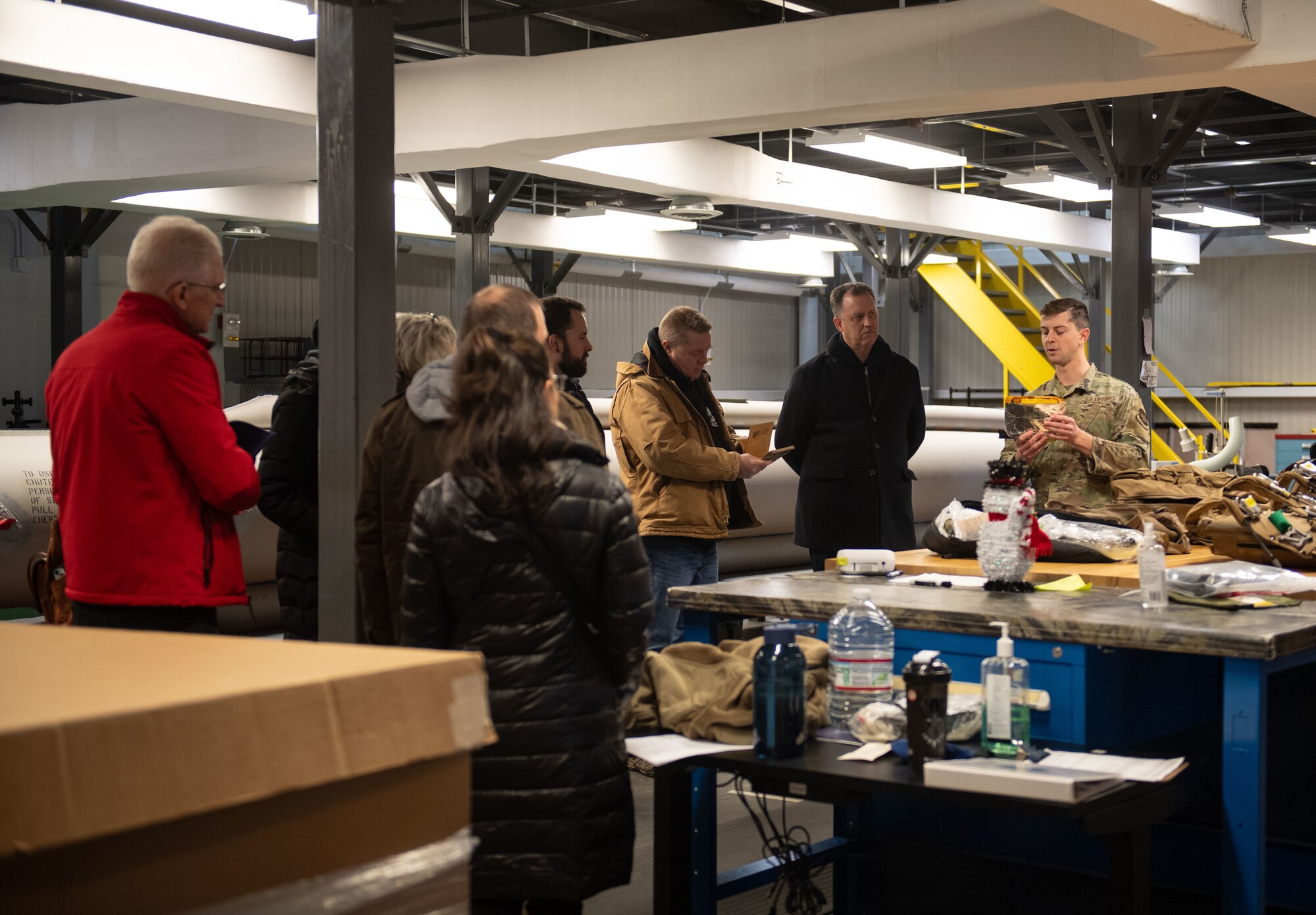 Airman demonstrates flight equipment