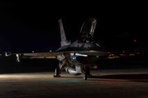 An aircraft sits on the flightline.