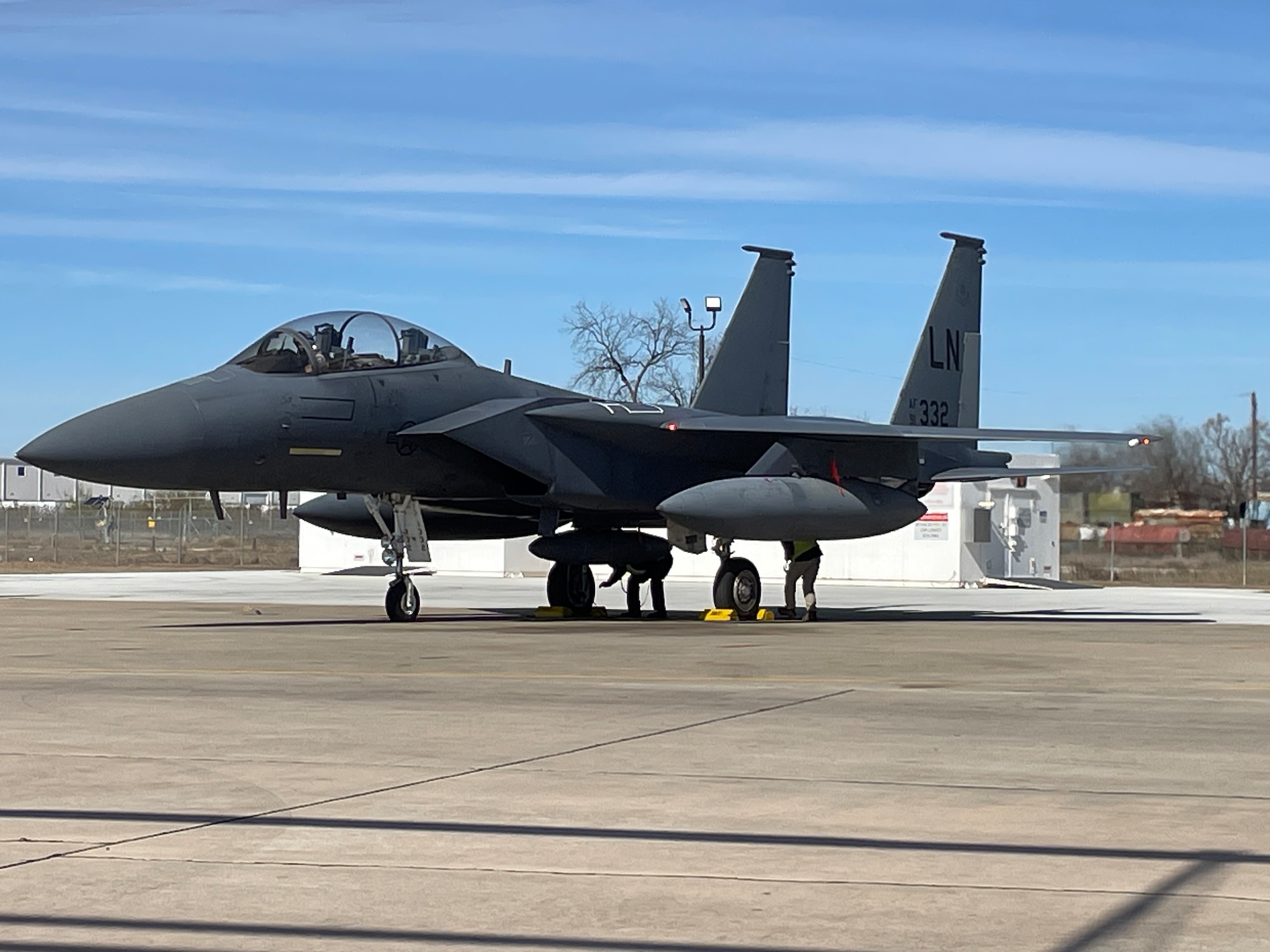 An F-15E on a flightline in San Antonio, Texas. The aircraft was recently upgraded with Eagle Passive/Active Warning and Survivability System, advanced electronic warfare system. (Boeing photo)