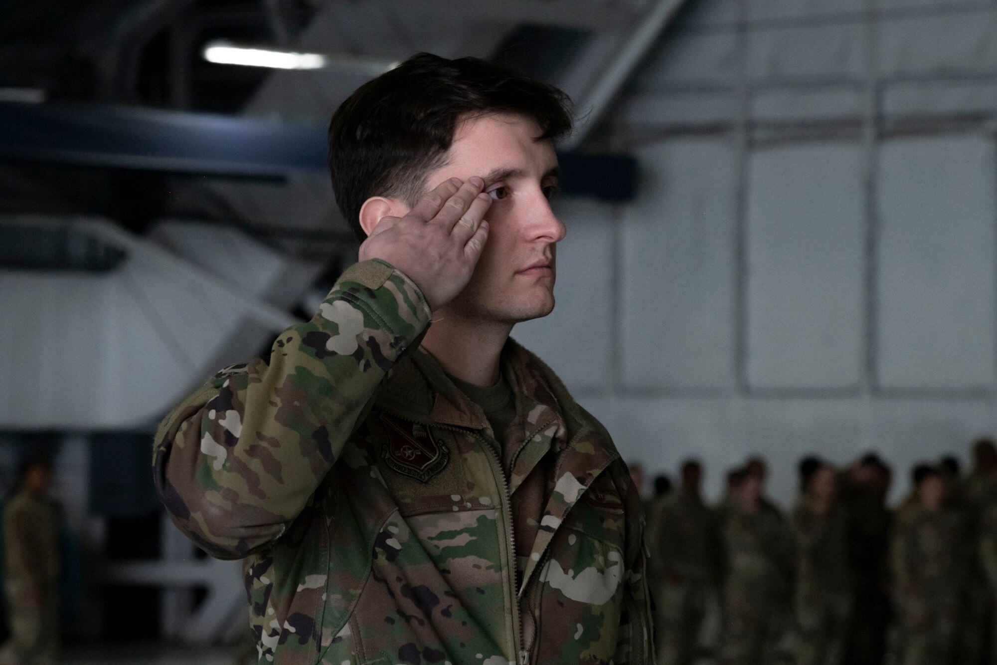 A U.S. Airman assigned to the Joint Task Force-National Capital Region salutes during a street cordon rehearsal at Joint Base Andrews, Md., Jan. 16, 2025. Military participation in presidential inaugurations is a centuries-old tradition in which the U.S. Armed Forces celebrate democracy, honor the new commander in chief, and recognize civilian control of the military. (U.S. Air Force photo by Senior Airman Julia Lebens)