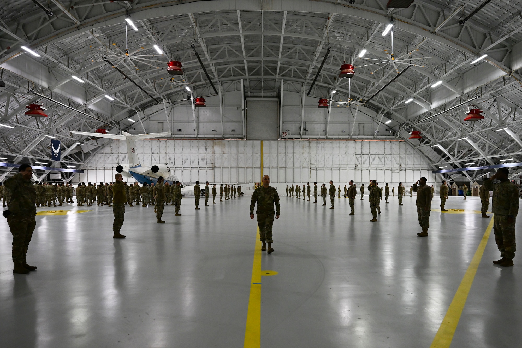 U.S Air Force Master Sgt. Alejandro Alba, 60th Presidential Inauguration Street Cordon noncommissioned officer in charge, inspects Airmen during the street cordon rehearsal at Joint Base Andrews, Md., Jan. 16, 2025. Alba ensured that Airmen understood the order of operations for the inauguration, demonstrating proper customs and courtesies. (U.S. Air Force photo by Senior Airman Julia Lebens)