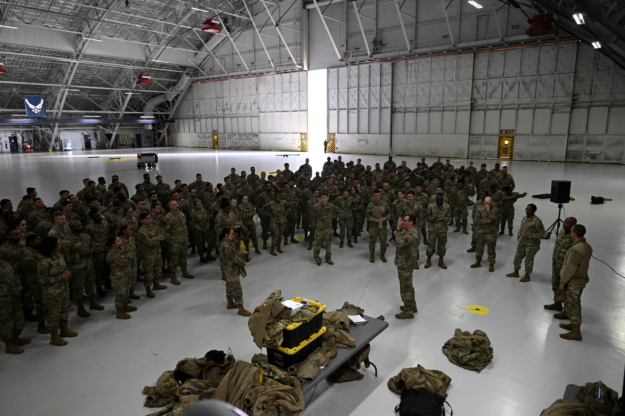 U.S. Air Force Airmen assigned to the Joint Task Force-National Capital Region debrief during a street cordon rehearsal at Joint Base Andrews, Md., Jan. 16, 2025. Airmen from the 316th Wing, 844th Communications Group, and members with the 11th Wing, Joint Base Anacostia-Bolling, D.C., were selected to serve as street cordon members for the 60th Presidential Inauguration. (U.S. Air Force photo by Senior Airman Julia Lebens)