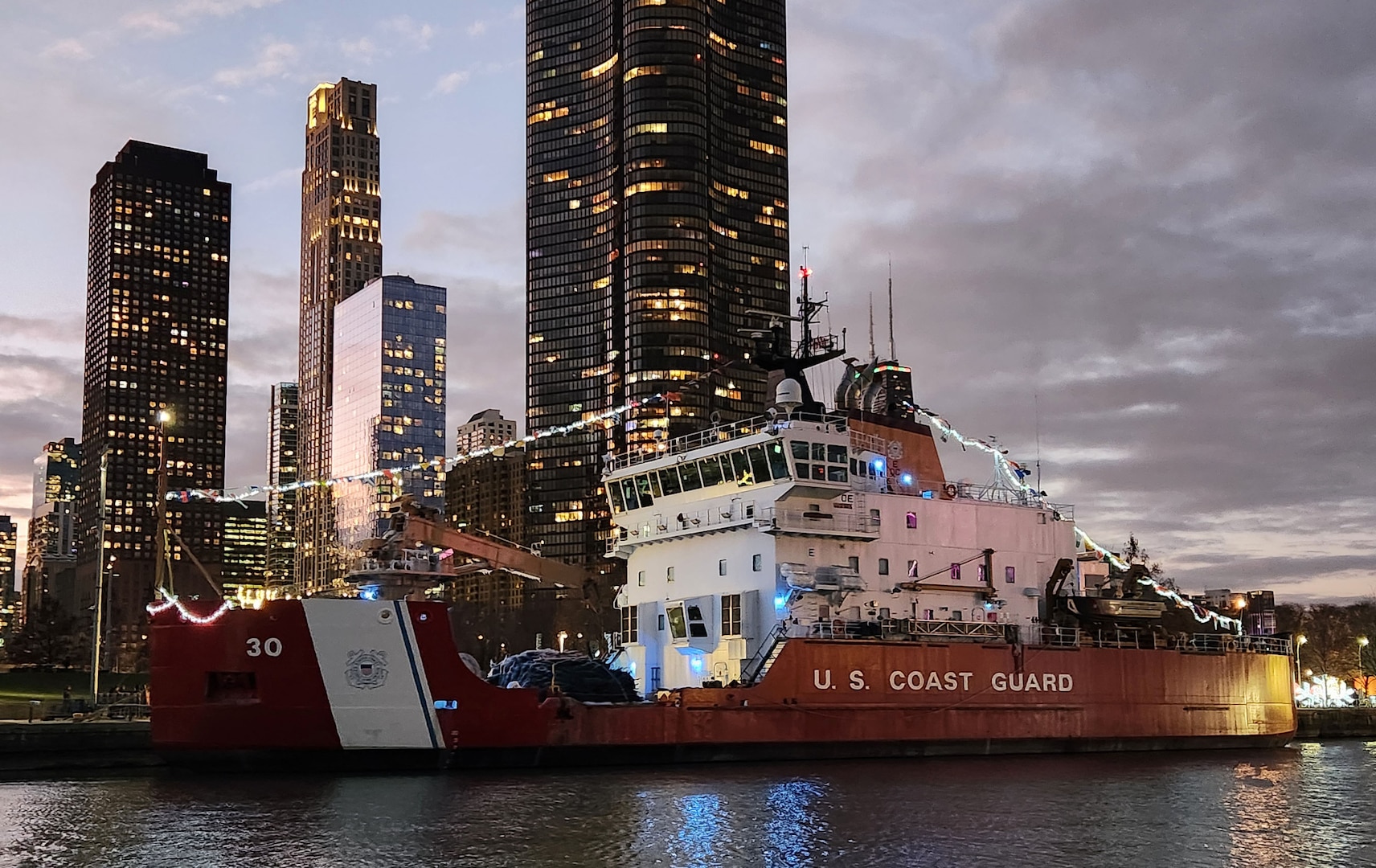 USCGC Mackinaw WLBB-30 docked at Navy Pier in Chicago, IL with Christmas Trees on the deck. The trees will be offloaded tomorrow by crew members and volunteers and sent to various community organizations where they will be given to needy families.( U.S. Coast Guard Photo by AUXPA1 Matthew Thompson)