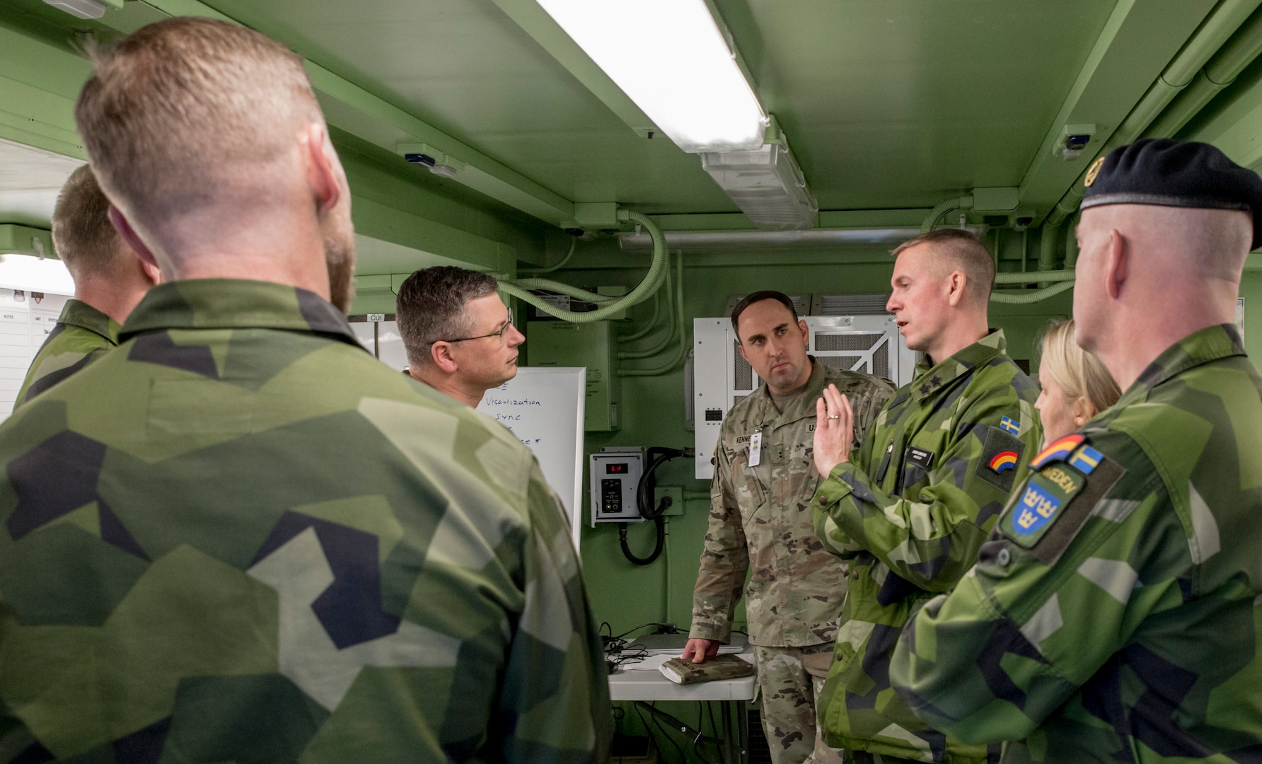 Swedish military staff officers meet with leaders of the New York Army National Guard’s 42nd Infantry Division at Fort Indiantown Gap, Pennsylvania, during a command post exercise Nov. 21, 2024. The exercise was one of three command post exercises held to prepare for a division Warfighter exercise that begins Jan. 24, 2025.