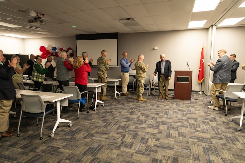 Retired U.S. Army Maj. Gen. Stephen Collins gets a standing ovation at his retirement ceremony at Bluegrass Station in Lexington, Kentucky on Dec. 10, 2025.