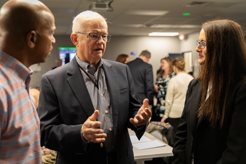 Retired U.S. Army Maj. Gen. Stephen Collins talks with guests at his retirement ceremony at Bluegrass Station in Lexington, Kentucky on Dec. 10, 2025.