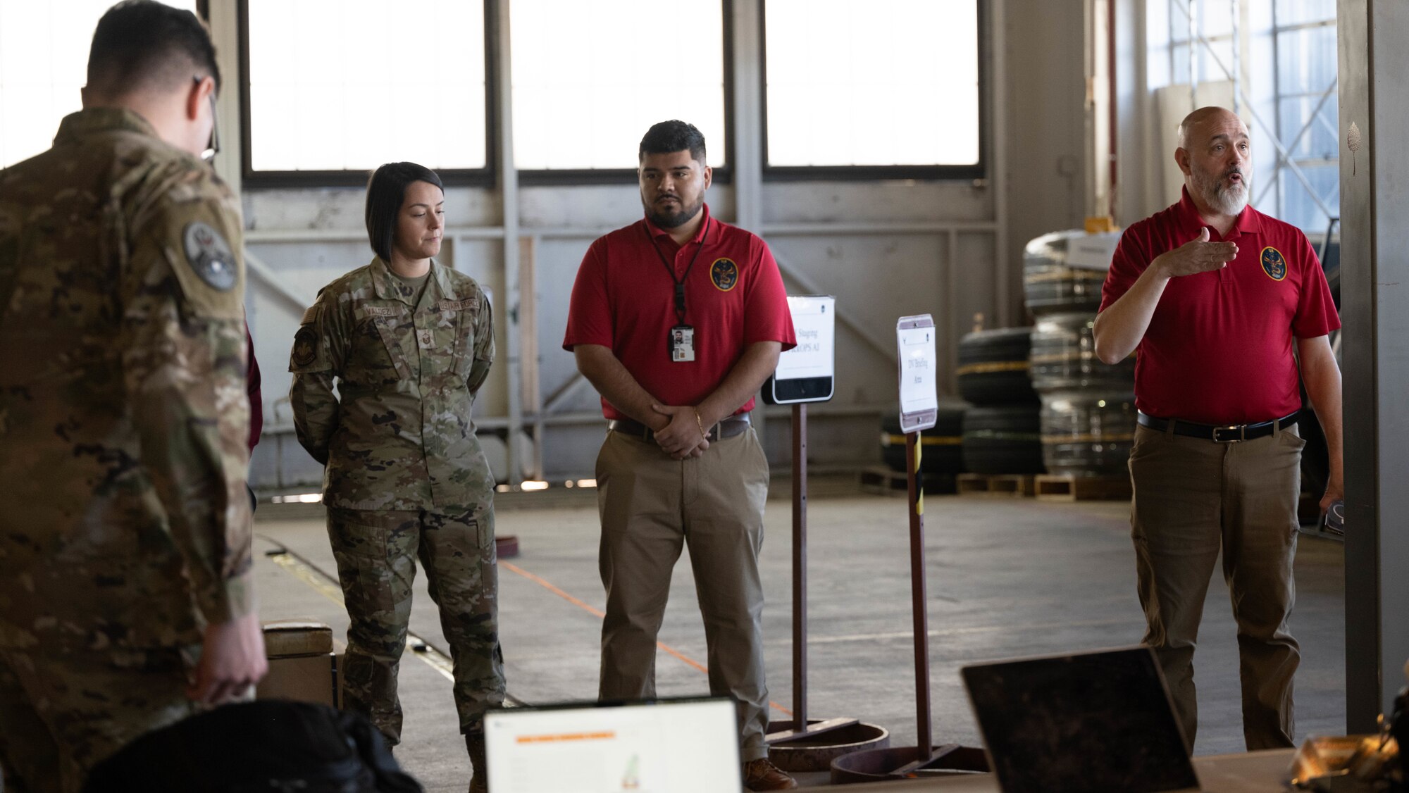 Event proctors give a safety brief at the start of the space logistics challenge at Peterson Space Force Base, Colorado, Jan. 15, 2025. The space logistics challenge brought together members of different skill levels as a comparison to see the efficiency of the artificial intelligence being tested in the event. (U.S. Space Force photo by Staff Sgt. Jaime Sanchez)