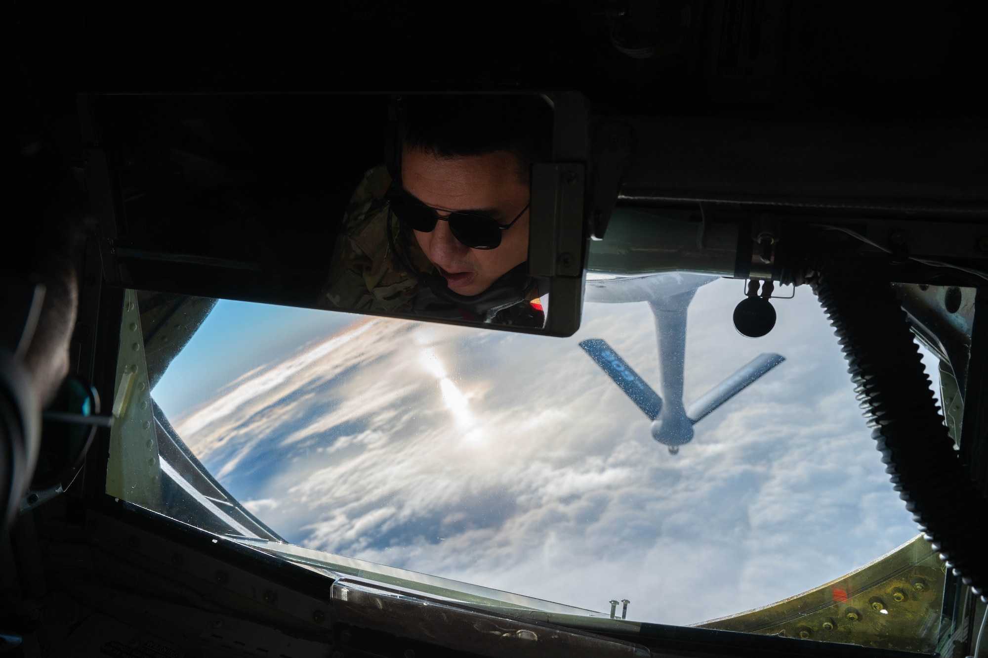 An Airman prepares to conduct aerial refueling.