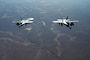 Two U.S. Navy EA-18G Growlers fly in formation during an Operation Inherent Resolve mission over the U.S. Central Command area of responsibility.