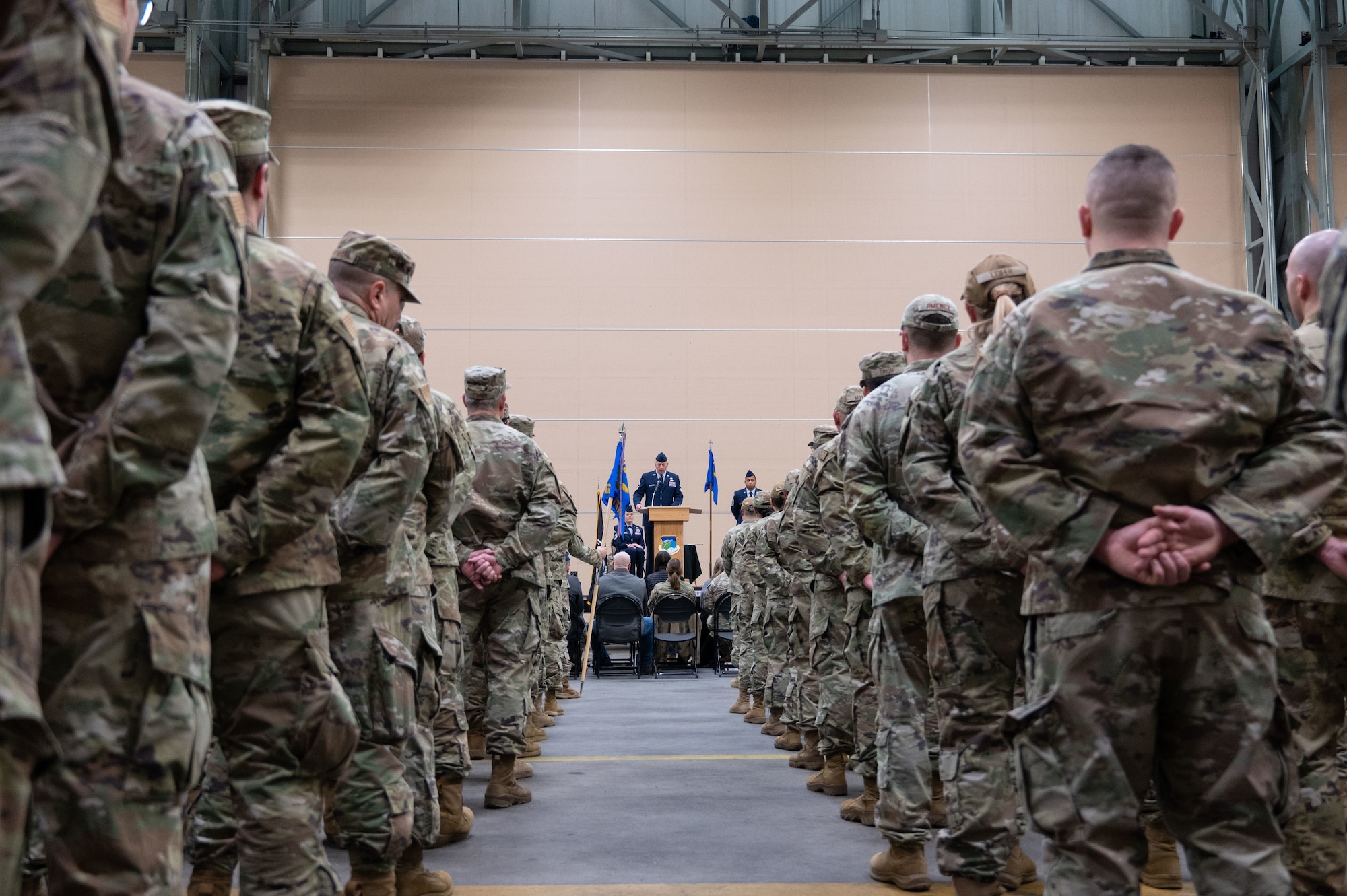 Airmen stand in formation.
