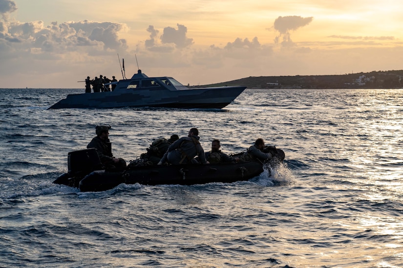 Sailors from the U.S. and Cyprus work together in the waters off Cyprus.