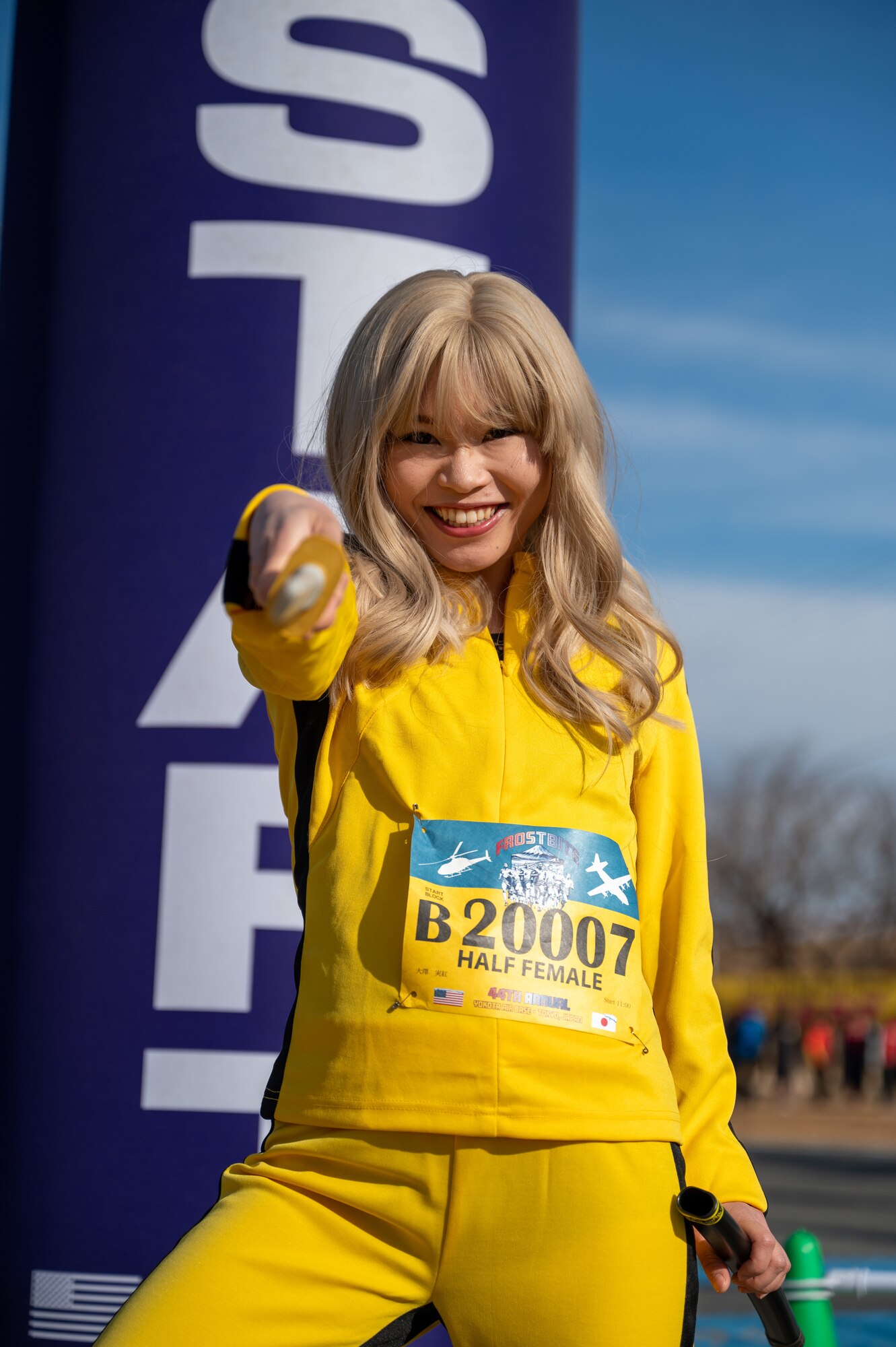 A runner poses for a photo during the 44th Annual Frostbite Road Race at Yokota Air Base, Japan.
