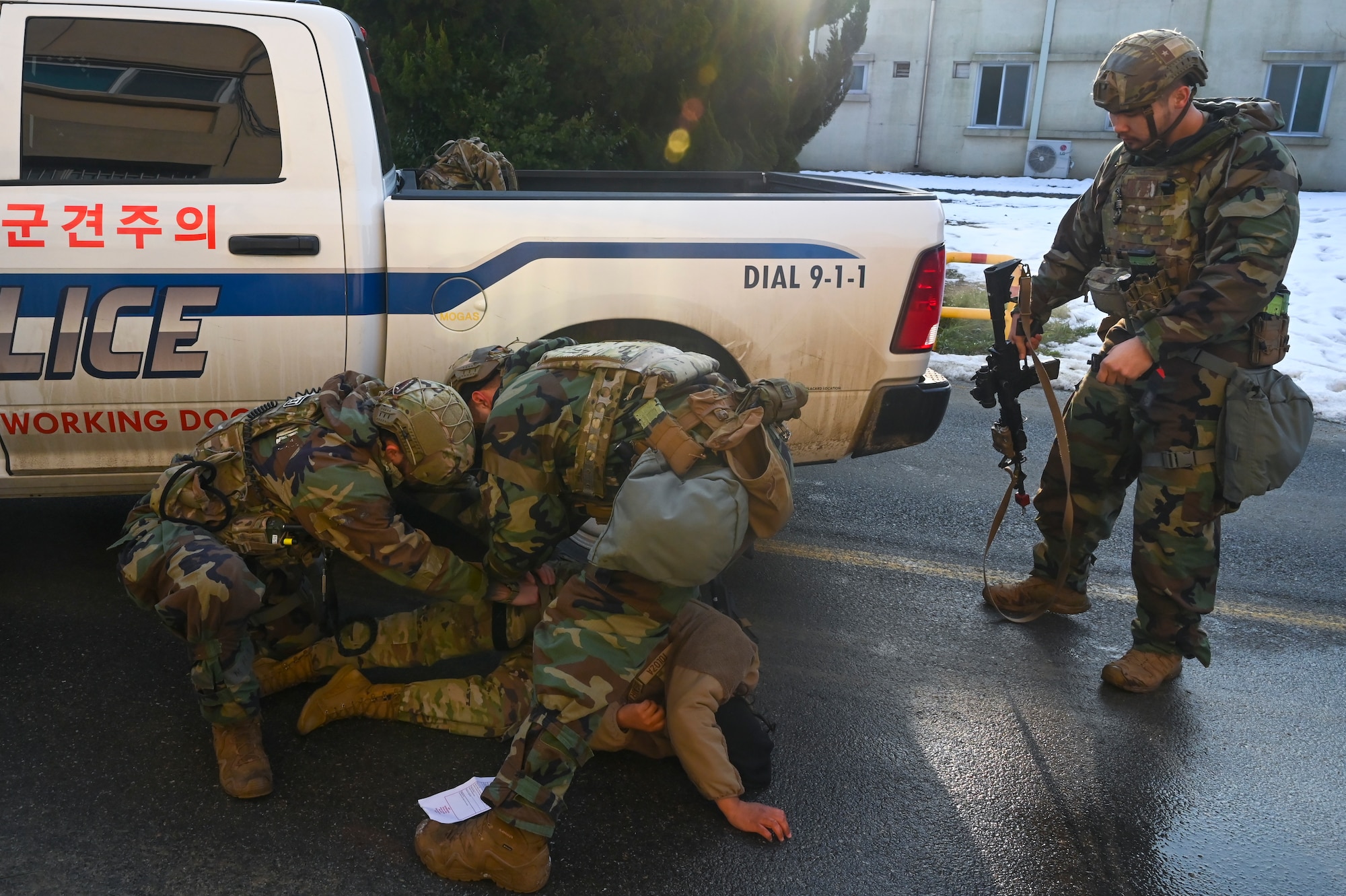 Airmen assigned to the 8th Security Forces Squadron prepare to transport simulated patients during Beverly Pack 25-1.