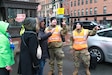 U.S. Army Spc. Kane Lesoine (center) and Sgt. Savannah Carnes (right), motor transport operators assigned to the 121st Transportation Company, 213th Regional Support Group, Pennsylvania Army National Guard, direct pedestrians in Washington, D.C. while supporting interagency partners for the 60th Presidential Inauguration as part of Joint Task Force-District Columbia Jan. 19, 2025. Approximately 8,000 National Guard service members from approximately 40 states and territories comprise JTF-DC to support the 60th Presidential Inauguration, continuing a legacy that began in 1789 when their predecessors escorted George Washington to the first inauguration. At the request of civil authorities, these National Guard service members provide critical support such as crowd management, traffic control points, CBRN response, civil disturbance response and sustainment operations. Their expertise and seamless collaboration with interagency partners help ensure a safe and peaceful transition of power during this historic event. (U.S. Army National Guard photo by Sgt. 1st Class Shane Smith)