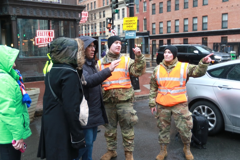 U.S. Army Spc. Kane Lesoine (center) and Sgt. Savannah Carnes (right), motor transport operators assigned to the 121st Transportation Company, 213th Regional Support Group, Pennsylvania Army National Guard, direct pedestrians in Washington, D.C. while supporting interagency partners for the 60th Presidential Inauguration as part of Joint Task Force-District Columbia Jan. 19, 2025. Approximately 8,000 National Guard service members from approximately 40 states and territories comprise JTF-DC to support the 60th Presidential Inauguration, continuing a legacy that began in 1789 when their predecessors escorted George Washington to the first inauguration. At the request of civil authorities, these National Guard service members provide critical support such as crowd management, traffic control points, CBRN response, civil disturbance response and sustainment operations. Their expertise and seamless collaboration with interagency partners help ensure a safe and peaceful transition of power during this historic event. (U.S. Army National Guard photo by Sgt. 1st Class Shane Smith)