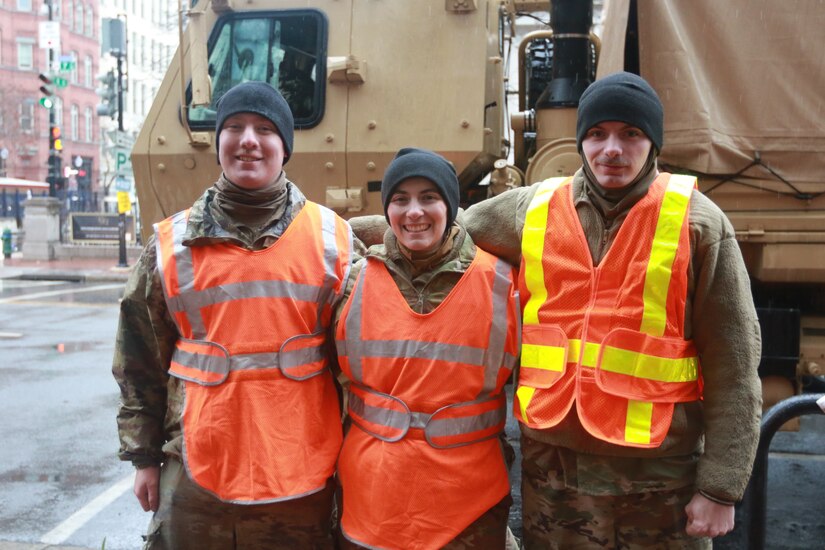 (Left to right) U.S. Army Spc. Kane Lesoine, Sgt. Savannah Carnes, and Pfc. Andrew Fling, a motor transport operator team assigned to the 121 Transportation Company, 213th Regional Support Group, Pennsylvania Army National Guard, man a traffic control point in Washington, D.C. in support of the 60th Presidential Inauguration Jan. 19, 2025. Approximately 8,000 National Guard service members from approximately 40 states and territories comprise JTF-DC to support the 60th Presidential Inauguration, continuing a legacy that began in 1789 when their predecessors escorted George Washington to the first inauguration. At the request of civil authorities, these National Guard service members provide critical support such as crowd management, traffic control points, CBRN response, civil disturbance response and sustainment operations. Their expertise and seamless collaboration with interagency partners help ensure a safe and peaceful transition of power during this historic event. (U.S. Army National Guard photo by Sgt. 1st Class Shane Smith)