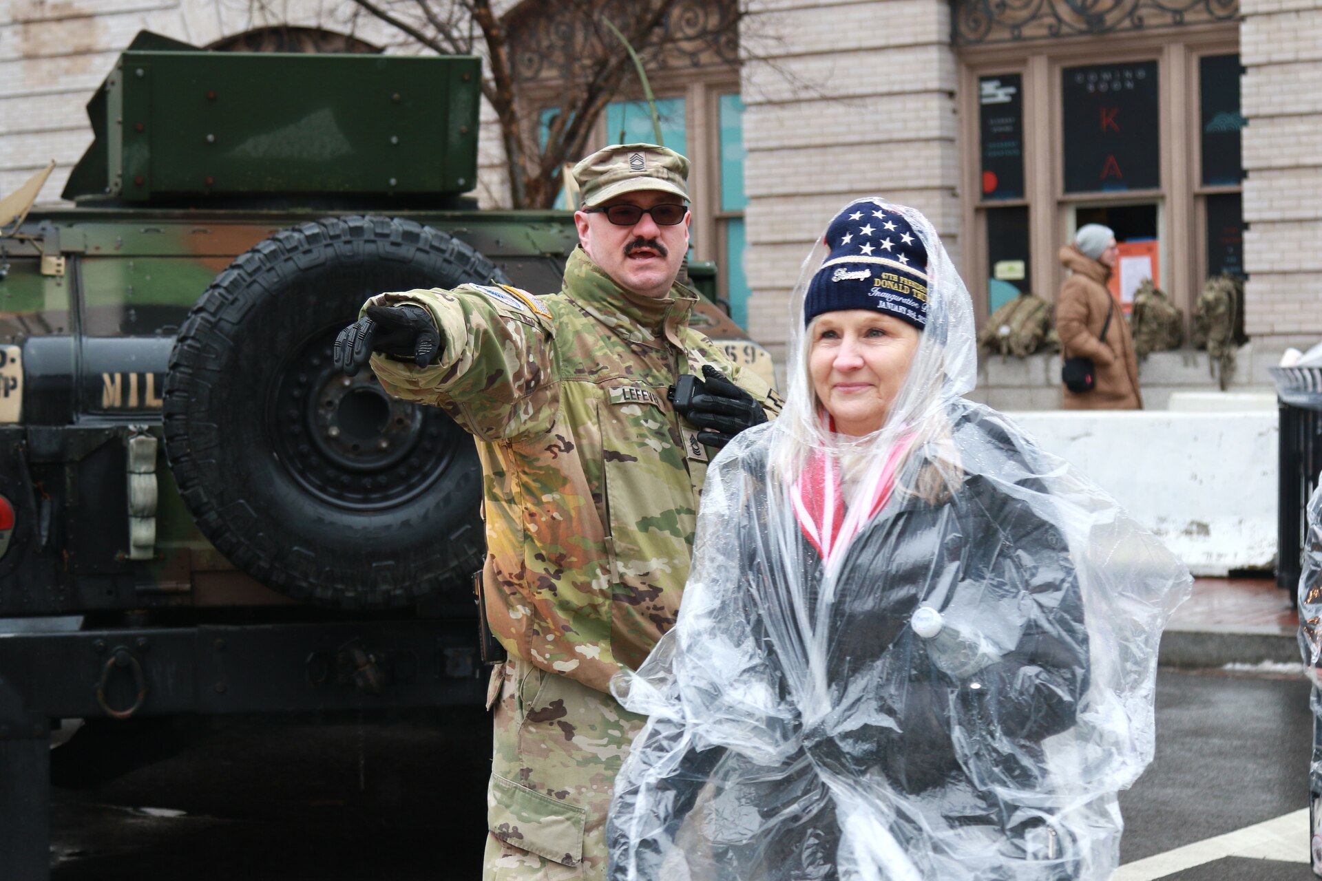 U.S. Army Staff Sgt. Brett Lefever, assigned to Headquarters Support Company, 55th Maneuver Enhancement Brigade, Pennsylvania Army National Guard, assists civil authorities by directing foot traffic in Washington, D.C. in support of the 60th Presidential Inauguration Jan. 19, 2025. Approximately 8,000 National Guard service members from approximately 40 states and territories comprise JTF-DC to support the 60th Presidential Inauguration, continuing a legacy that began in 1789 when their predecessors escorted George Washington to the first inauguration. At the request of civil authorities, these National Guard service members provide critical support such as crowd management, traffic control points, CBRN response, civil disturbance response and sustainment operations. Their expertise and seamless collaboration with interagency partners help ensure a safe and peaceful transition of power during this historic event. (U.S. Army National Guard photo by Sgt. 1st Class Shane Smith)