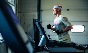 Service member works out
