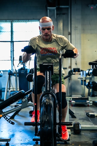 Service member works out